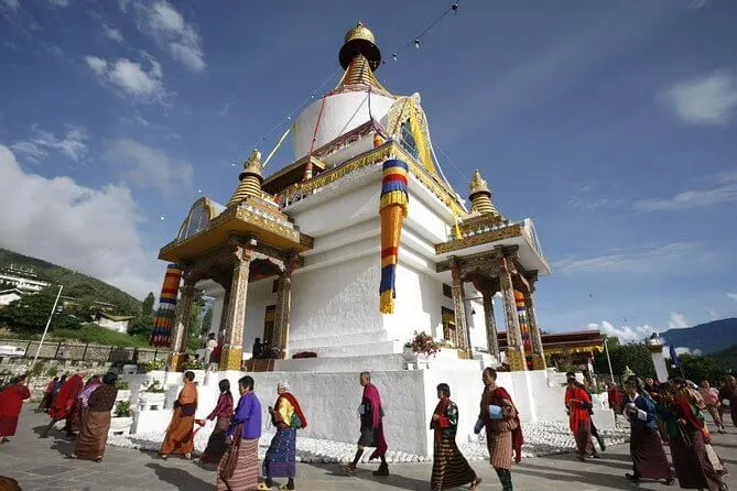 Pilgrims circling the white Memorial Chorten in Thimphu