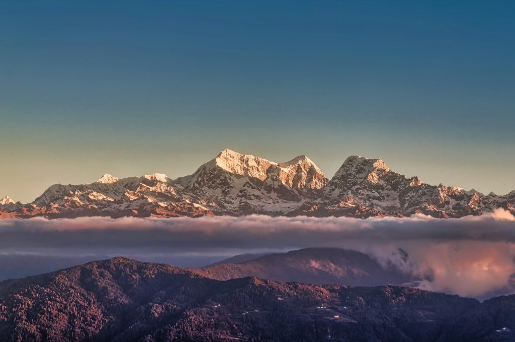 Aerial view of Himalayan peaks above the clouds