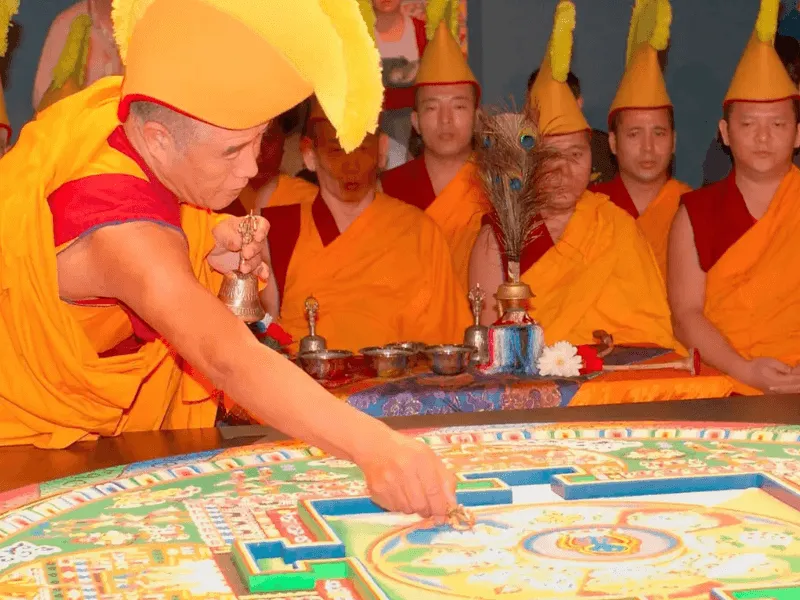 Monks creating a sand mandala in Bhutan